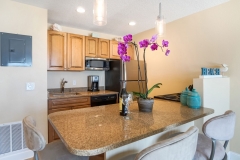 Spacious suite with sitting area and beach-inspired design at Glunz Ocean Beach Resort