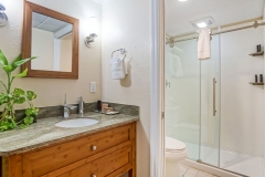 Standard king room with large windows and cozy furnishings at Glunz Resort
