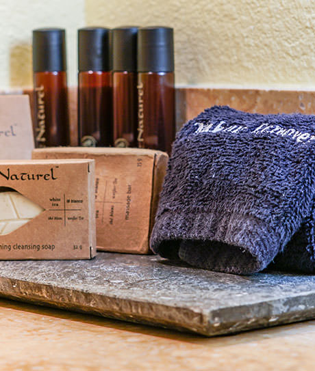 Soap bar, towel, and hair shampoo and condition display