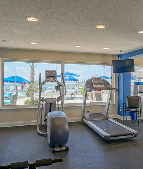 Treadmill and elliptical machine in fitness room